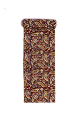 Fabric featuring a maroon scroll pattern with paisleys and floral elements on a cream background.