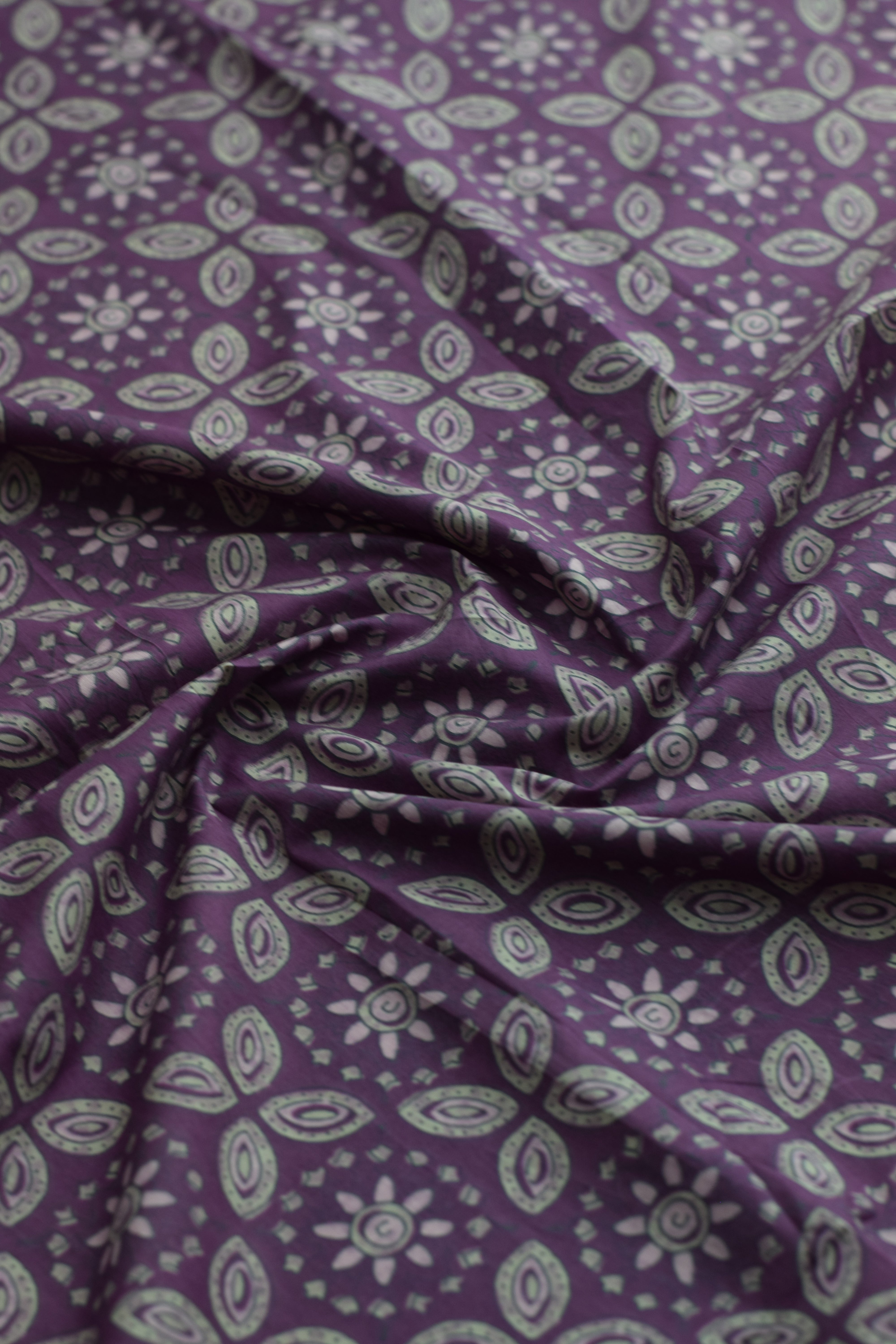 Purple fabric with floral patterns