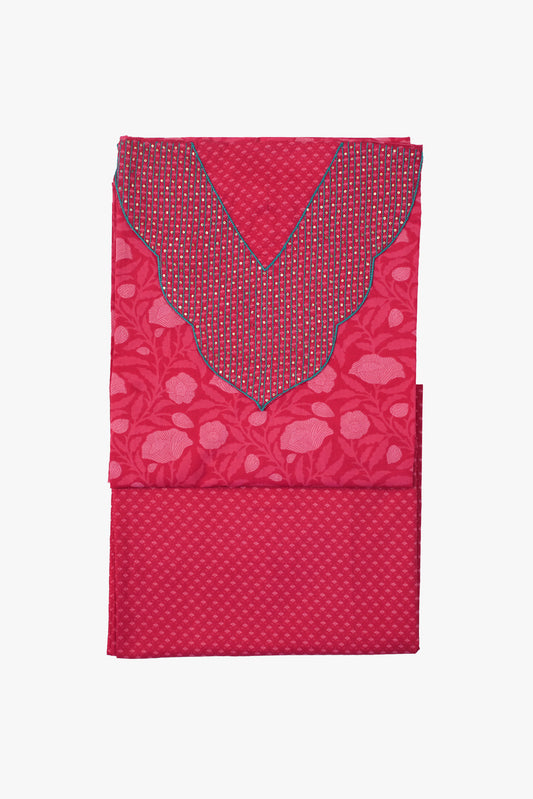 Red fabric with floral pattern and decorative cutout on a white background