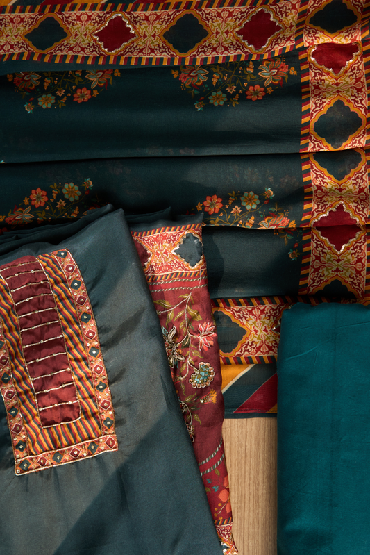 Close-up of embroidered fabric with intricate patterns and colors.