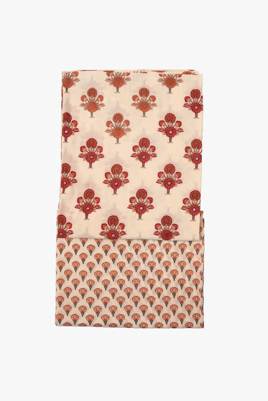 Folded fabric with red floral patterns on a beige background