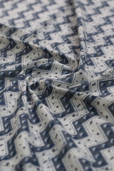 Close-up of patterned fabric with blue and white design