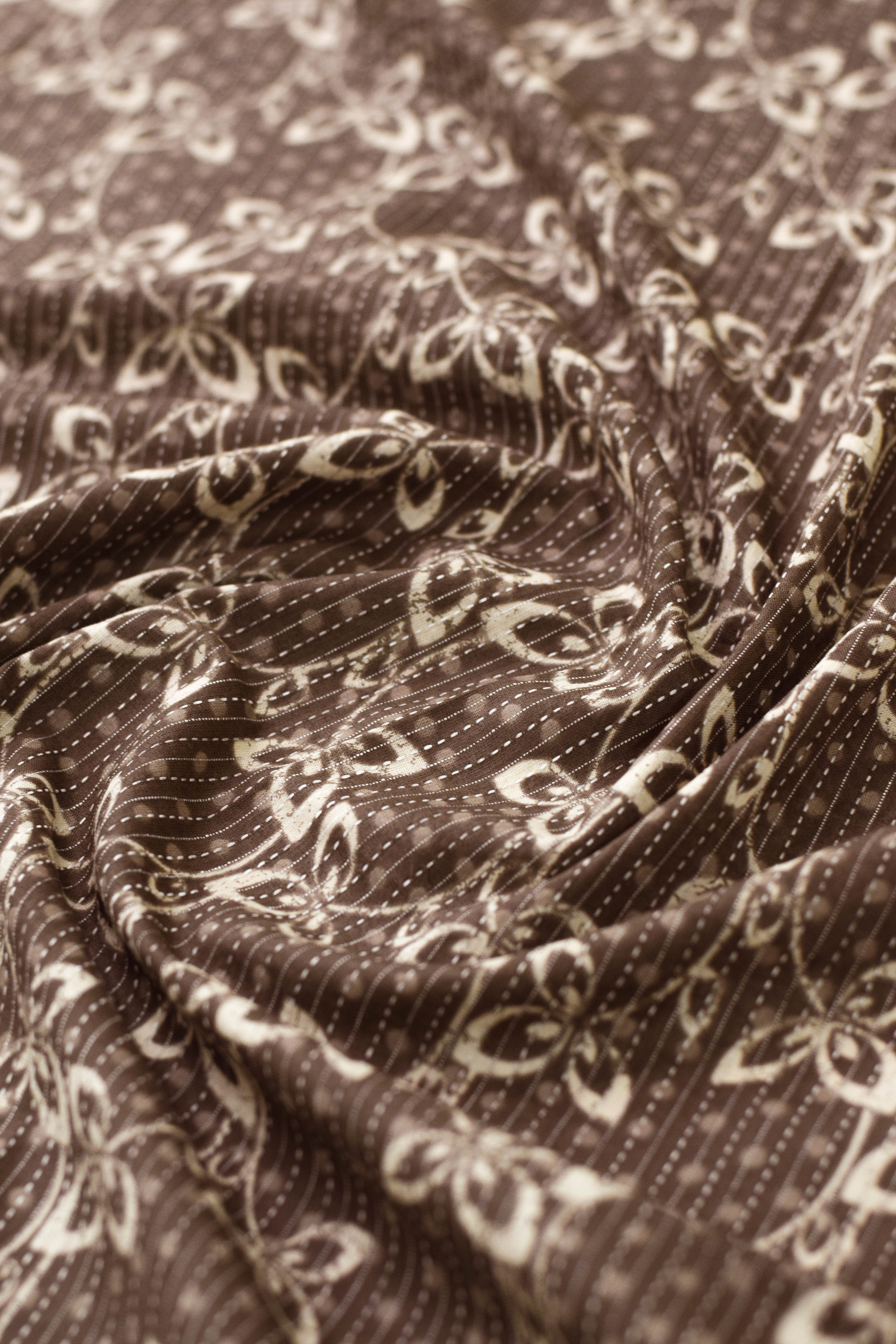 Close-up of patterned fabric with intricate design