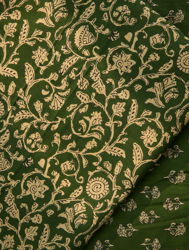 Green fabric with beige floral pattern