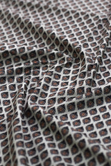 Close-up of patterned fabric with geometric design