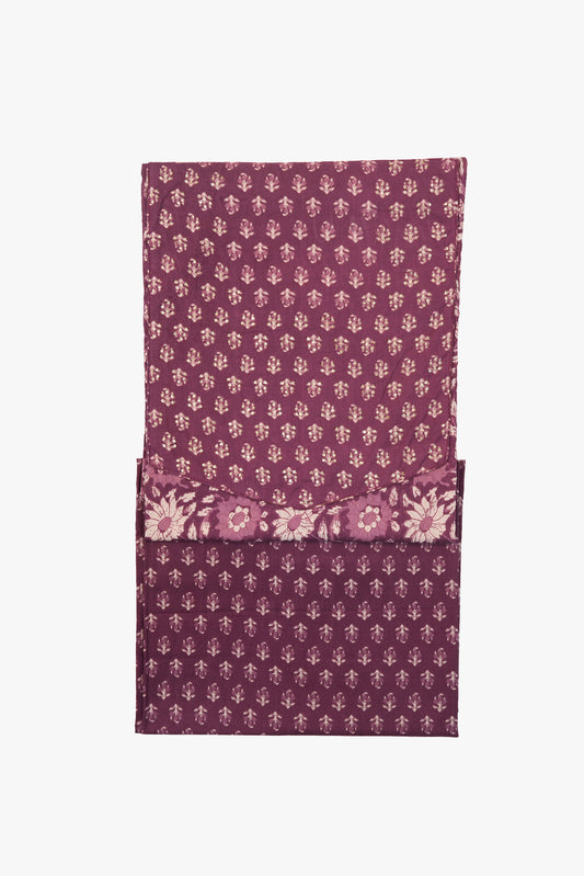Purple fabric with floral pattern on a white background