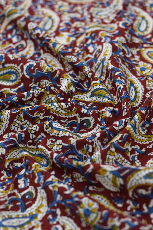 Close-up of colorful paisley patterned fabric.