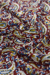 Close-up of colorful paisley patterned fabric.