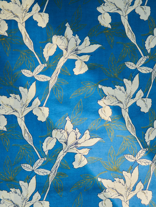 Floral pattern with white flowers on a blue background