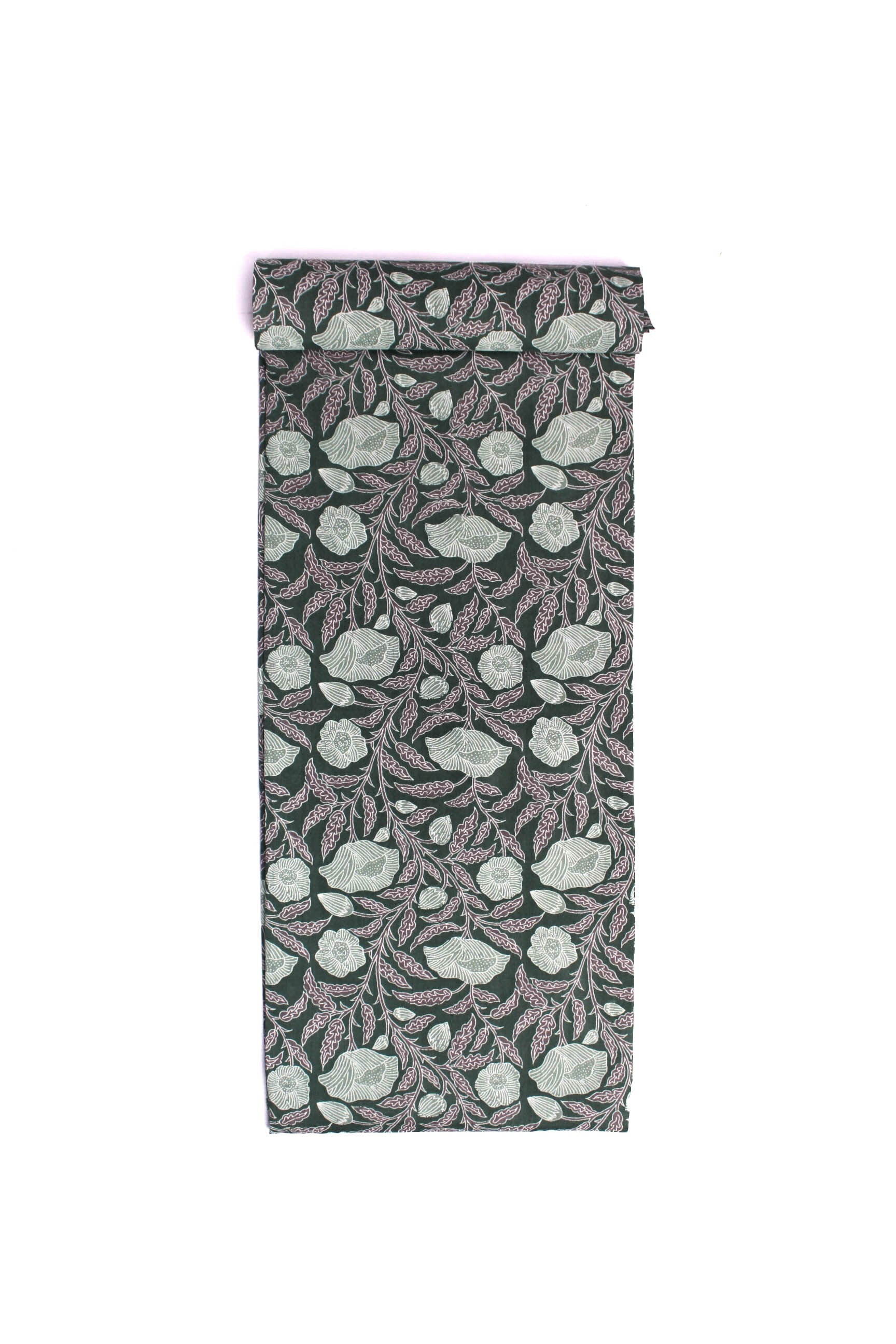 Fabric with a forest green background featuring sketched flowers and leaves in white and lilac.