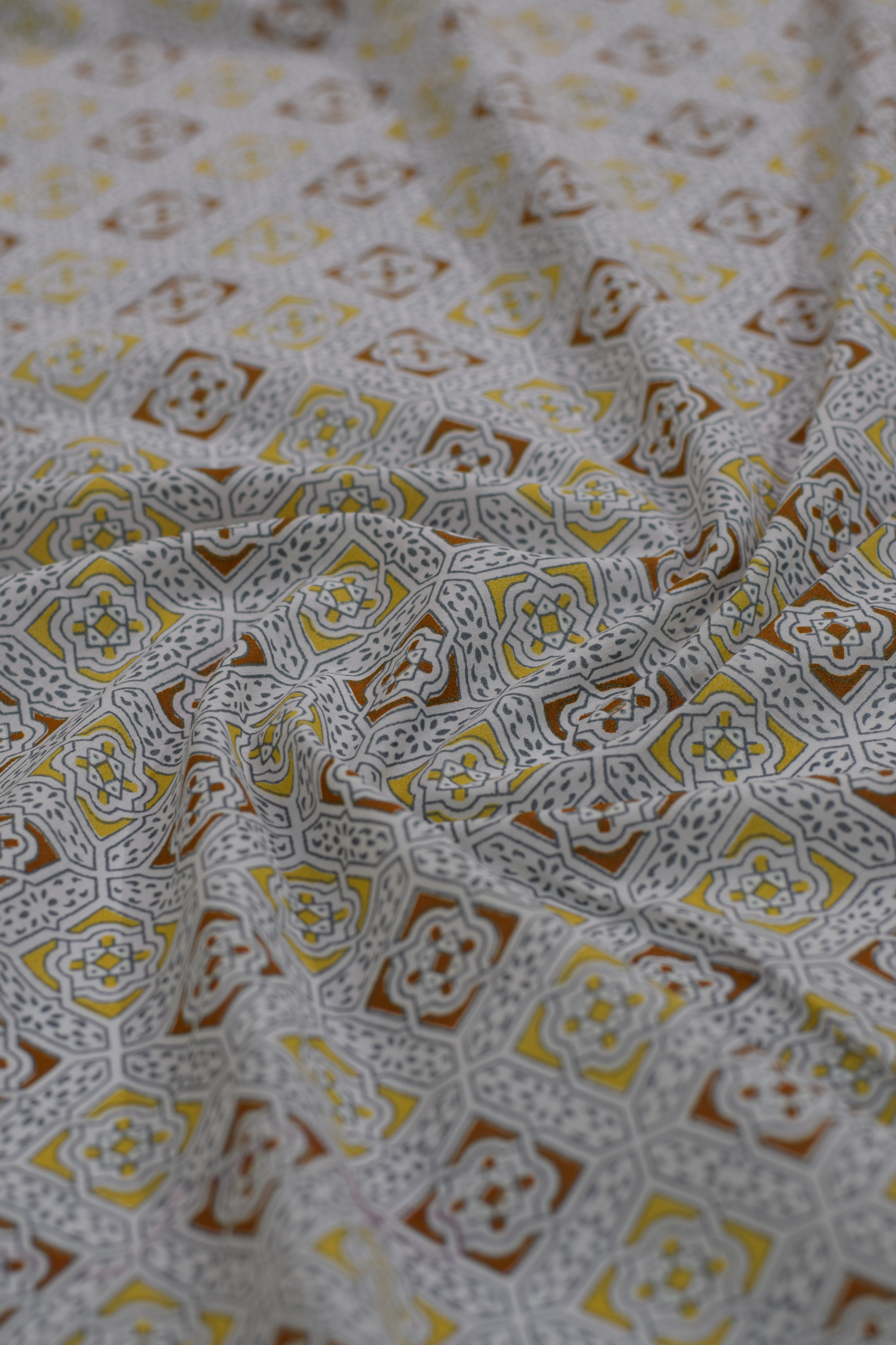 Close-up of patterned fabric with intricate design
