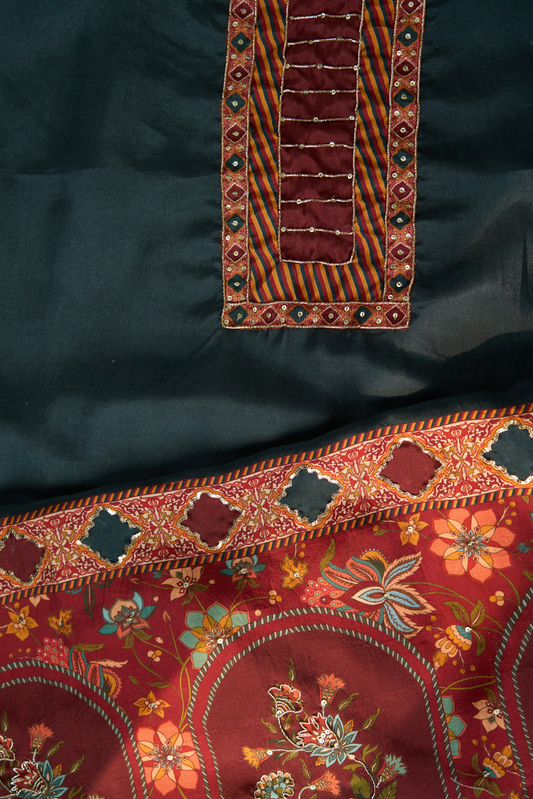 Close-up of embroidered fabric with floral patterns.