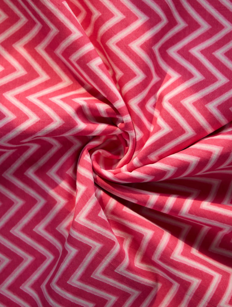 Pink and white zigzag patterned fabric