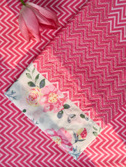 Floral-patterned on a pink and white zigzag fabric background