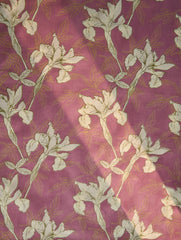 Floral pattern with white flowers on a pinkish-purple background