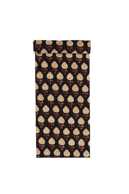 Black fabric with a bold beige floral pattern outlined in crimson and olive colors.