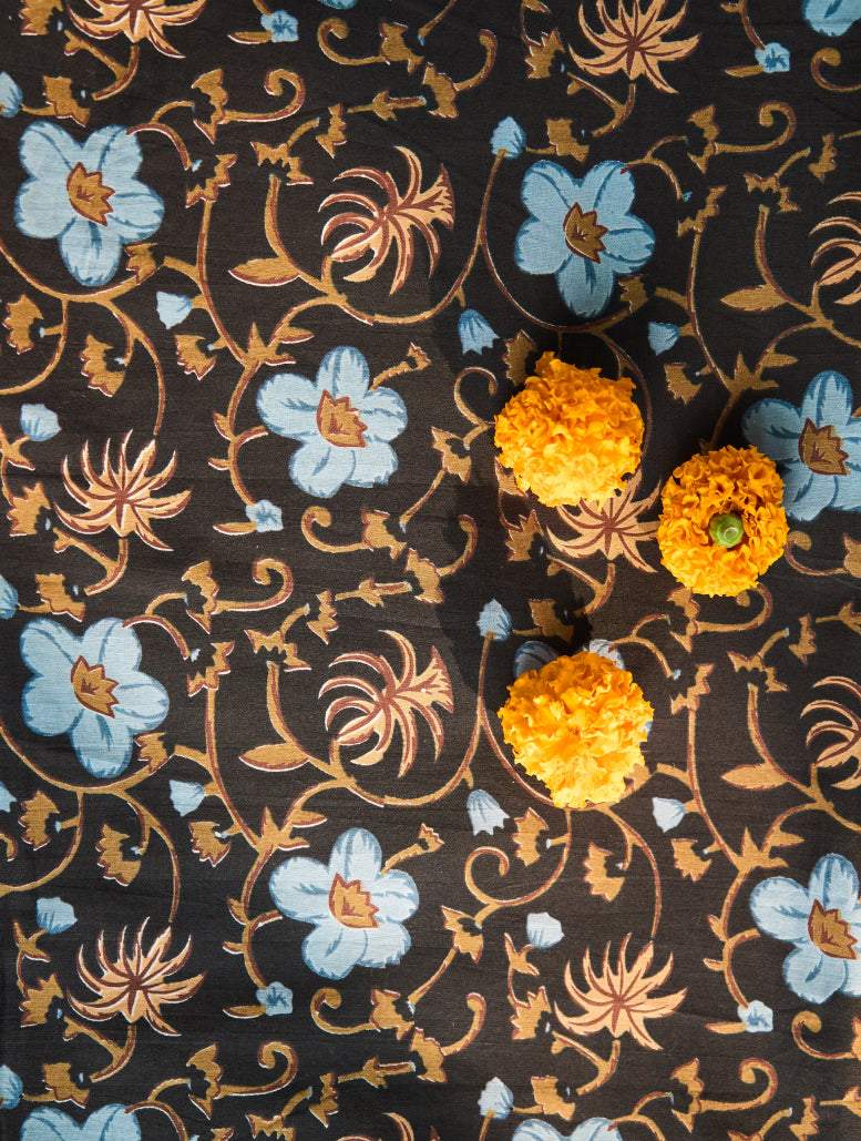Decorative fabric with floral patterns on a dark background