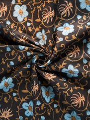 Floral patterned fabric with blue and orange flowers on a brown background