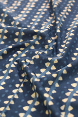 Navy blue fabric with gold geometric pattern