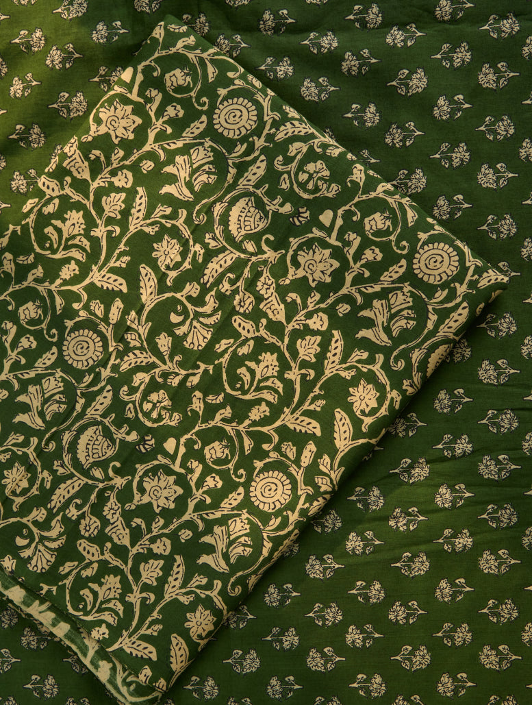 Green fabric with beige floral patterns