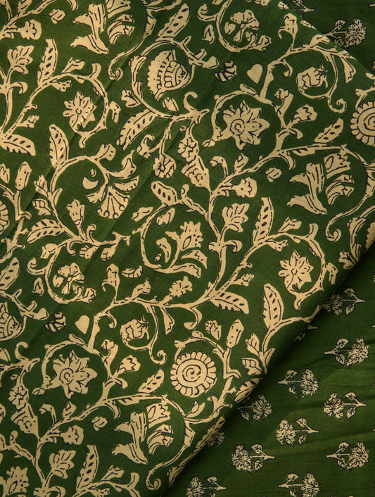 Green fabric with beige floral pattern