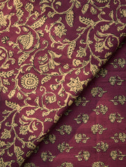 Maroon fabric with gold floral pattern
