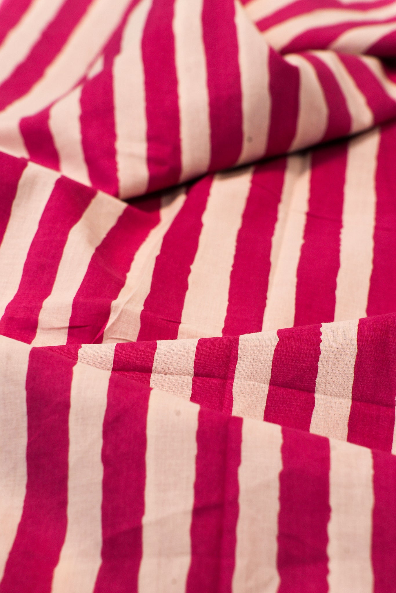 Close-up of red and beige striped fabric