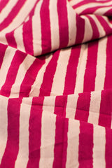 Close-up of red and beige striped fabric