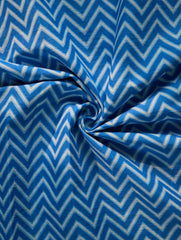 Blue and white zigzag patterned fabric
