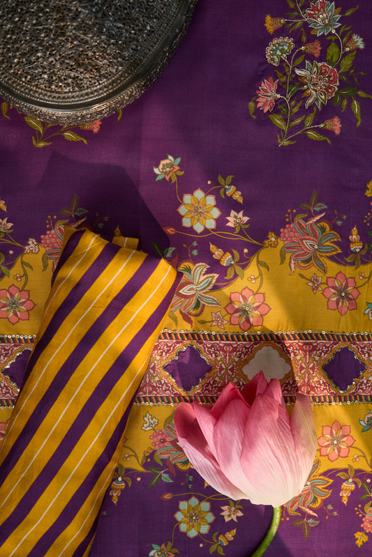 Purple fabric with floral patterns and yellow striped fabric