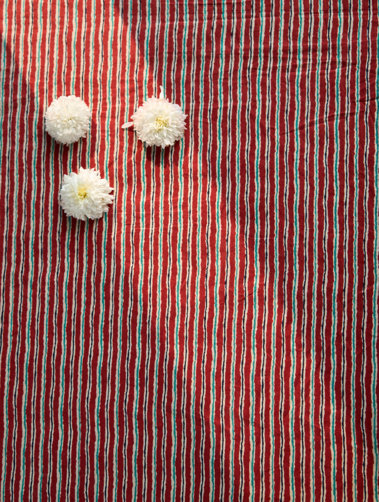 Striped fabric with red and blue striped background