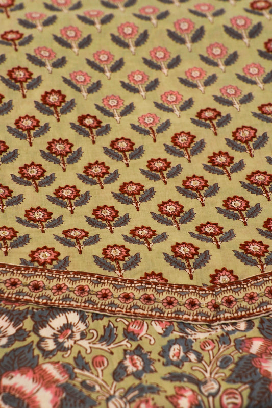 Patterned fabric with floral design on a olive background