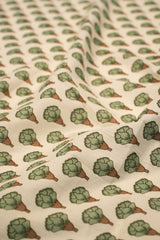 Pattern of green and brown flowers on a beige background