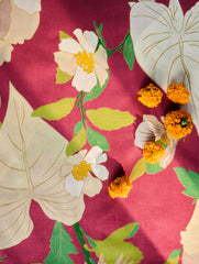 Floral pattern with white flowers, green leaves on a red background