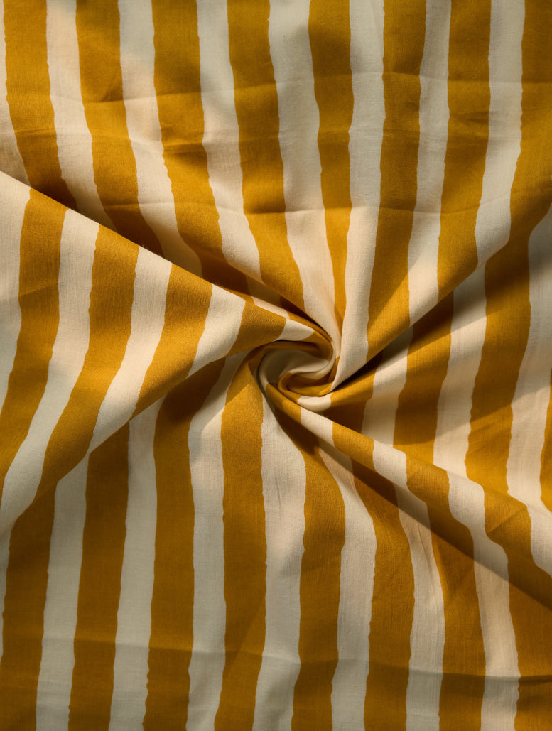 Yellow and white striped fabric