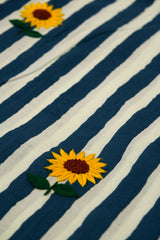 Striped fabric with embroidered sunflowers