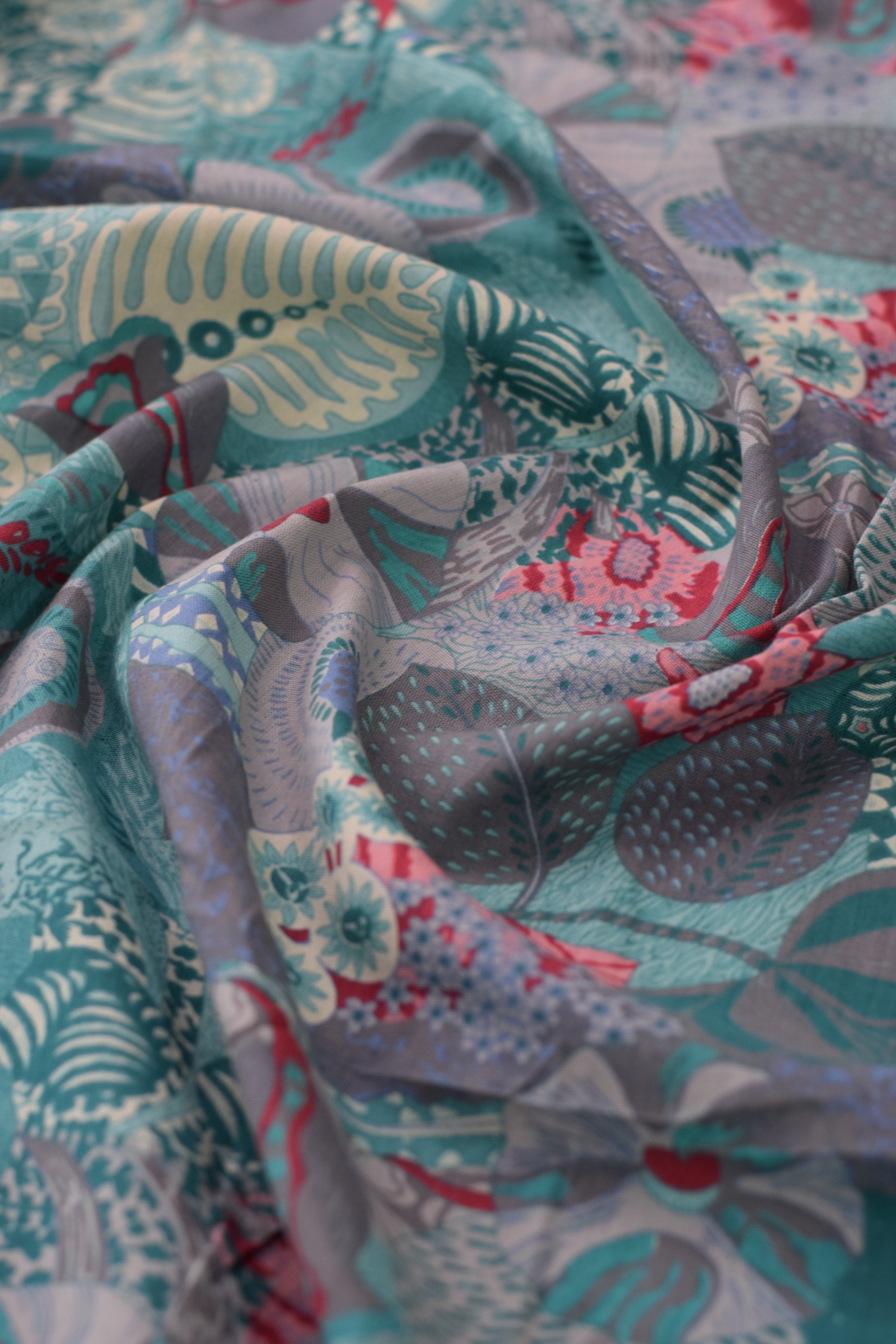 Close-up of patterned fabric with intricate designs.