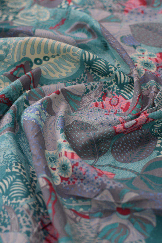 Close-up of patterned fabric with intricate designs.