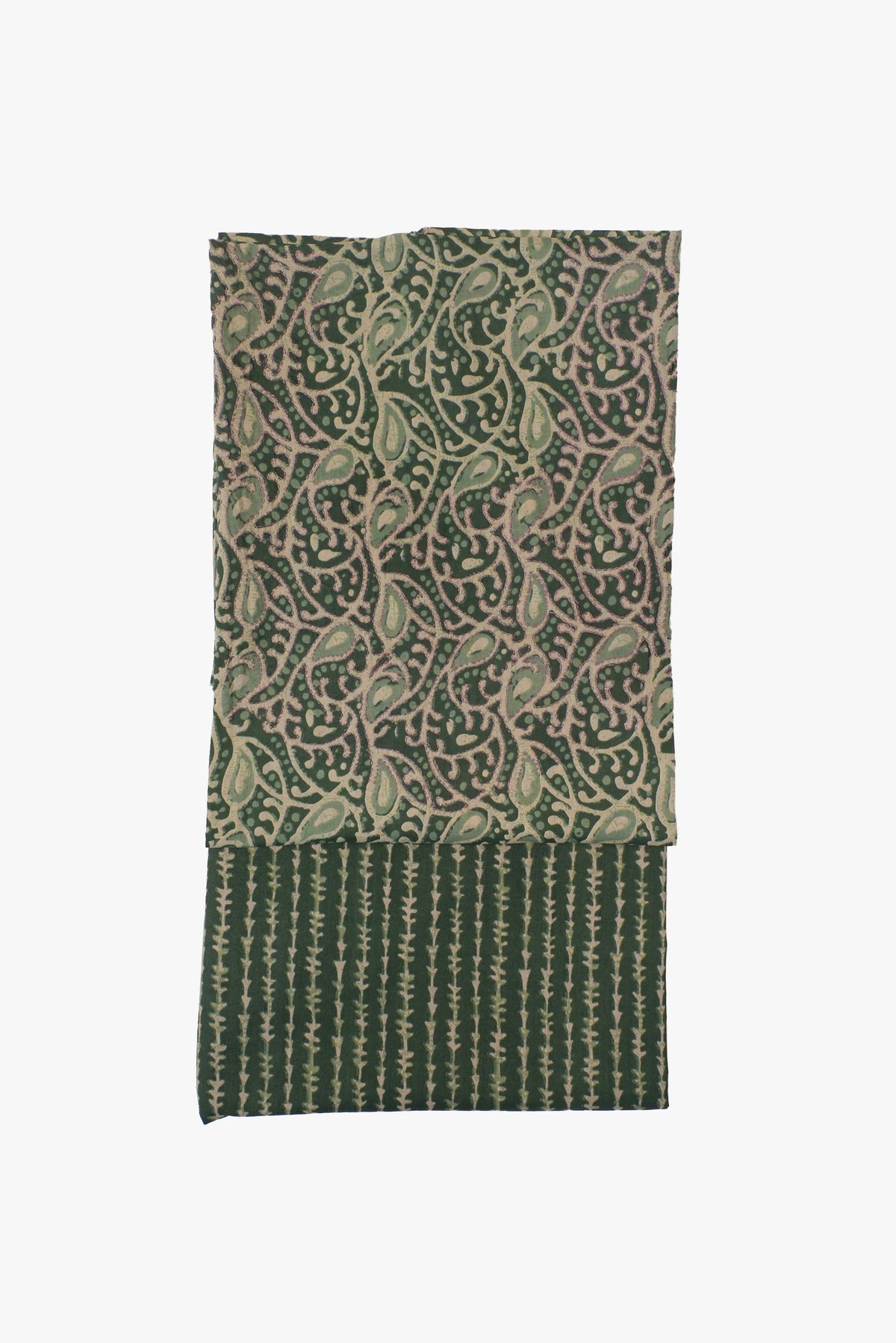 Green patterned fabric on a white background