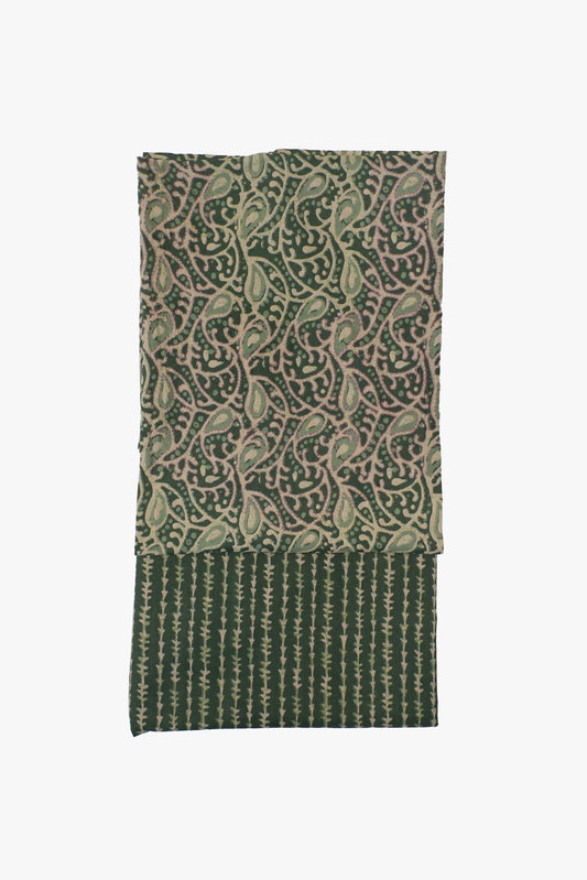Green patterned fabric on a white background